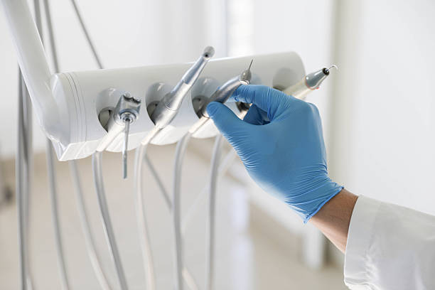 Professional Tooth Extraction technician working in Rockville, MD